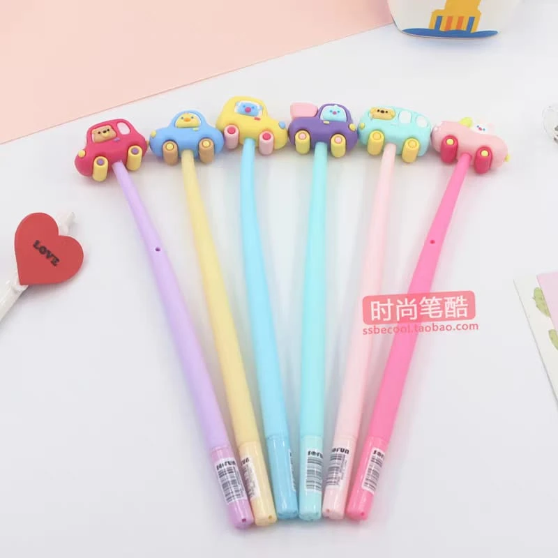 أقلام حبر جل مزينة بمجسمات كرتونية
